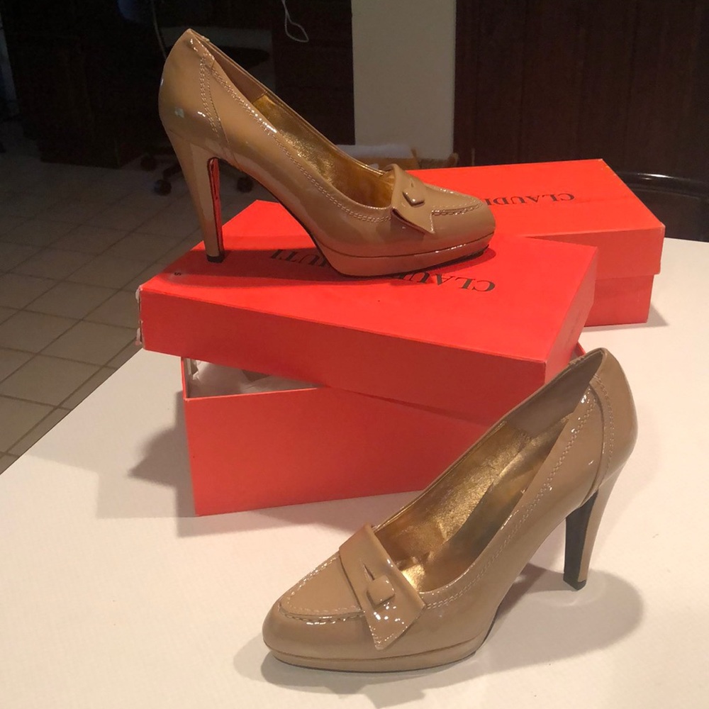 Platform shoes by Claudia Ciuti....